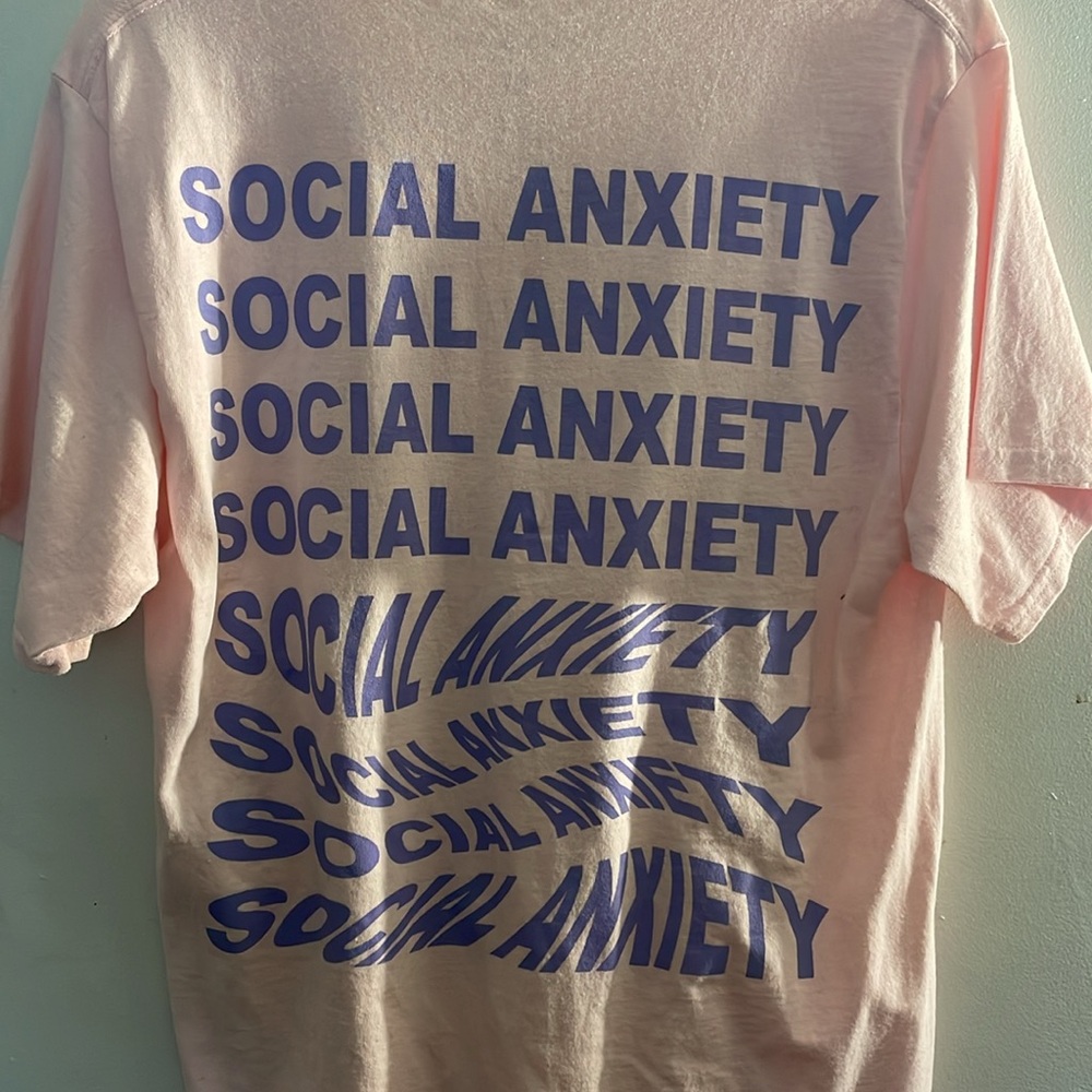 Men’s PacSun Light Pink Tee with Purple Graphic lettering. Size medium.